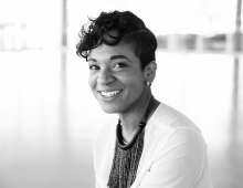 black and white portrait of a woman smiling